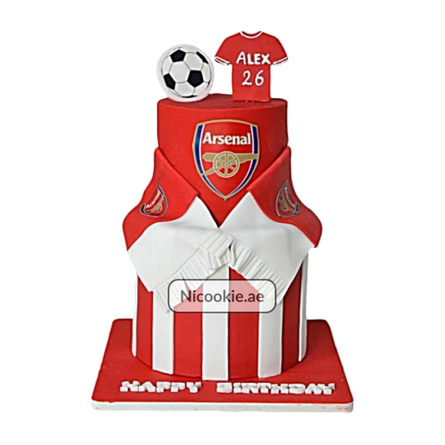 Arsenal football cake with jersey, soccer ball, and club logo.