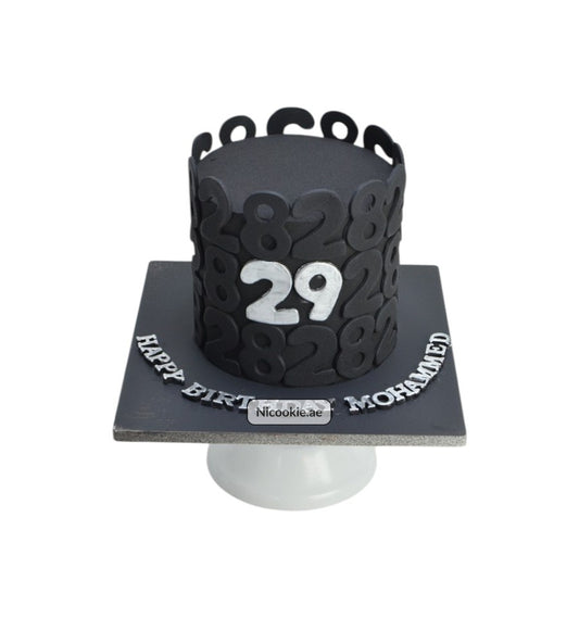 Black cake with "29" and "Happy Birthday Mohammed" text.