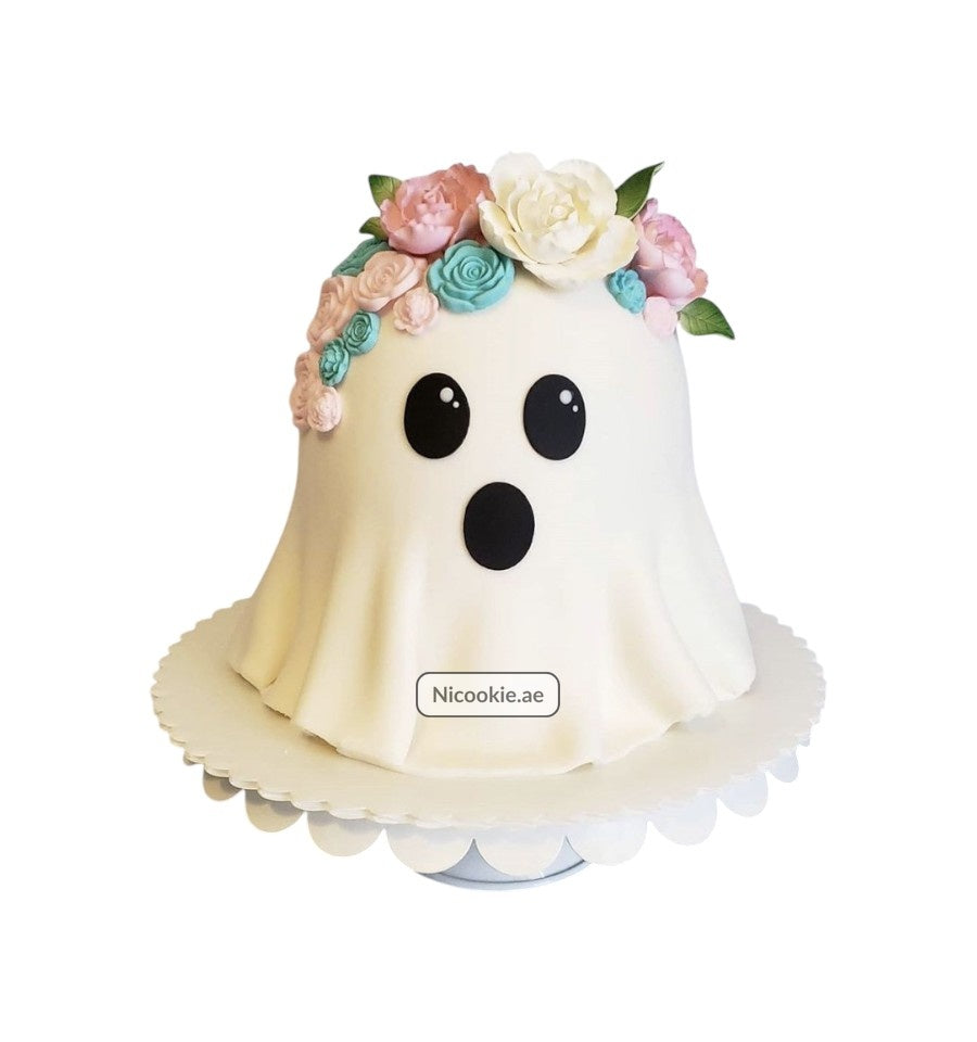 Floral ghost cake with pastel flowers and a surprised expression.