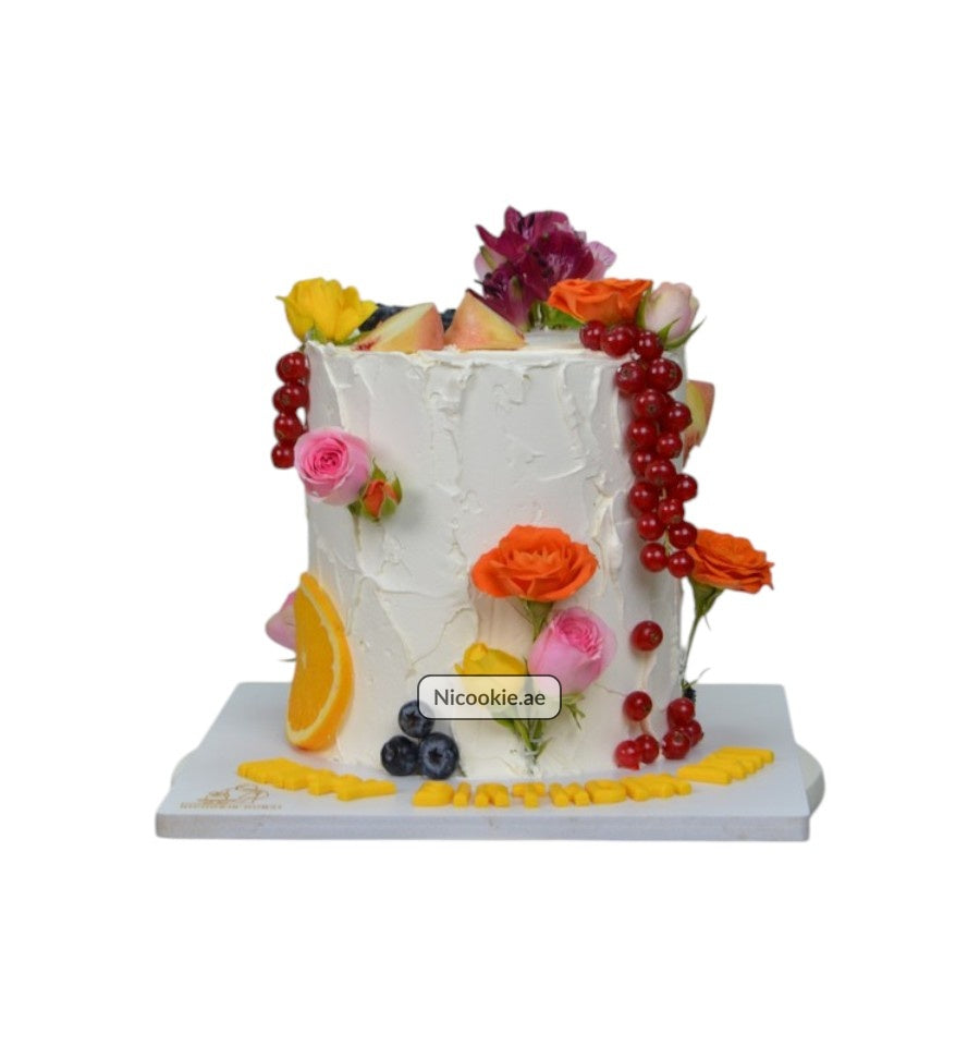 Floral Fruit Symphony cake with fresh flowers and fruits.