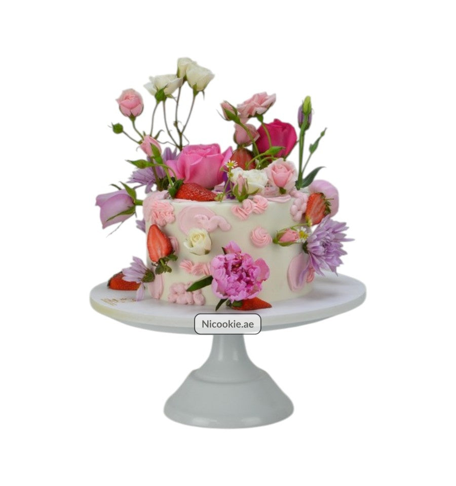 Floral Strawberry Dream cake with fresh strawberries and pink and white flowers.