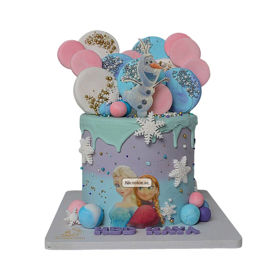 A Frozen themed cake with Elsa, Anna, and Olaf decorations.
