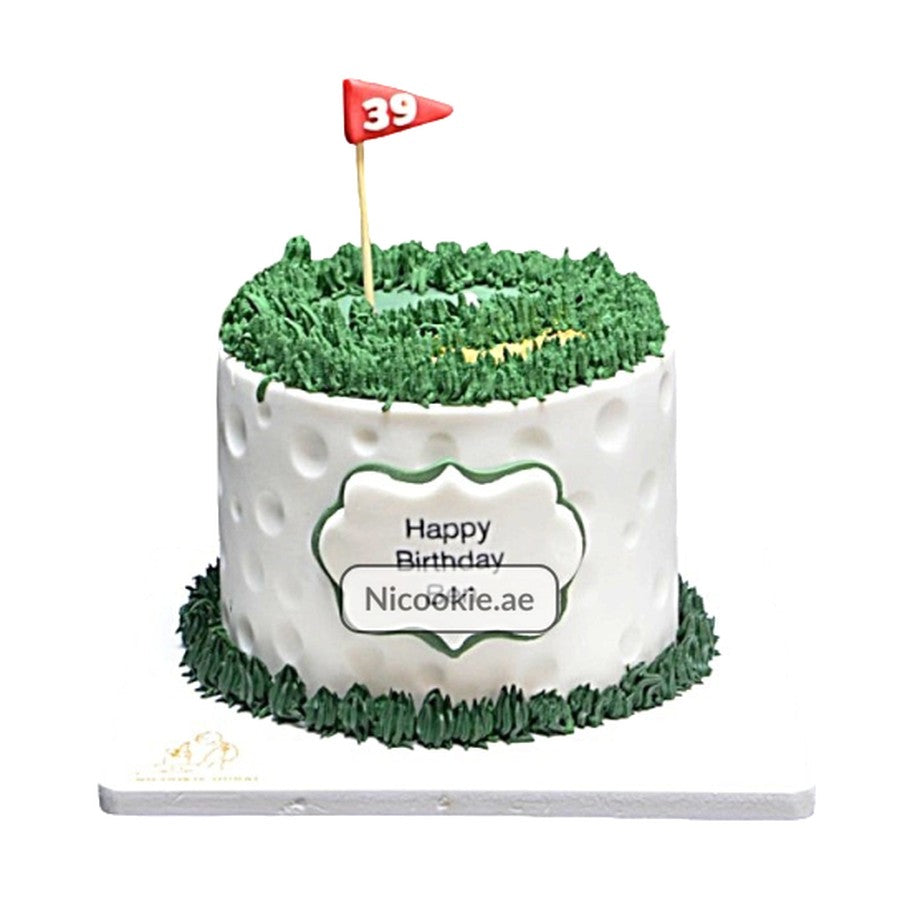 A golf-themed cake with green grass frosting and a red flag with the number 39.