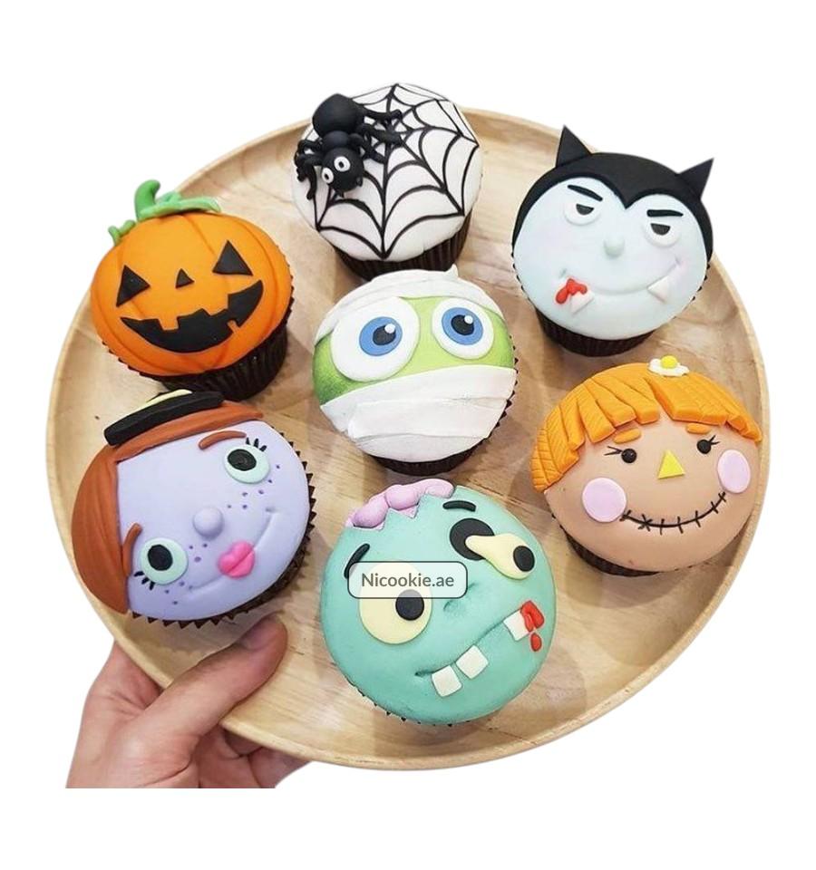 Monster Cupcake Medley with various Halloween-themed designs.