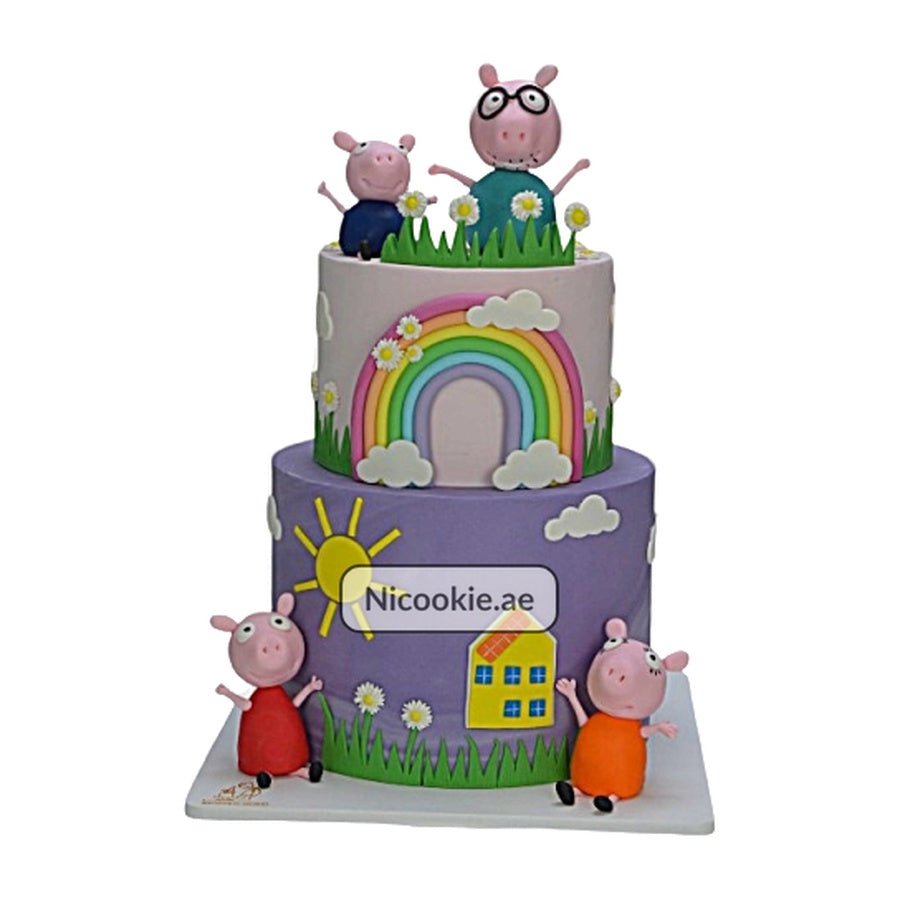 Peppa Pig rainbow cake with figurines and a house.