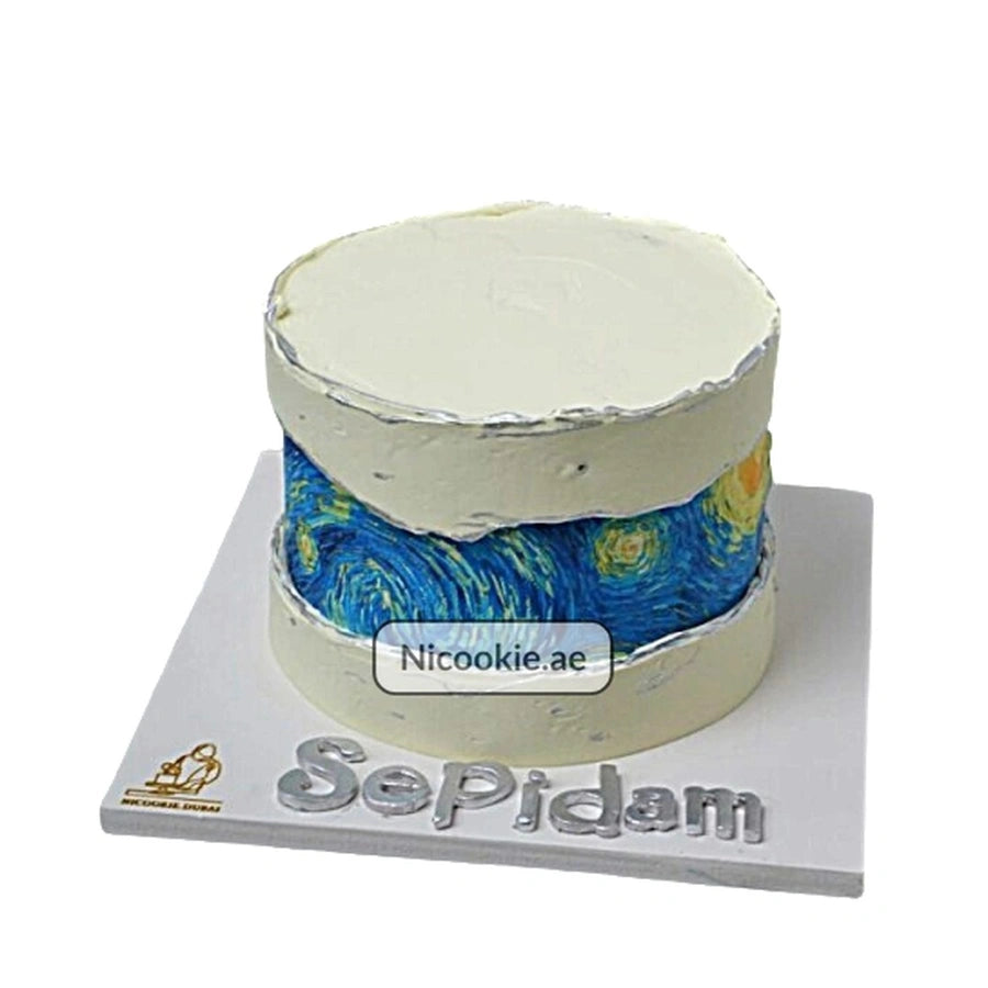 A round cake with a Starry Night design in the middle and white frosting.