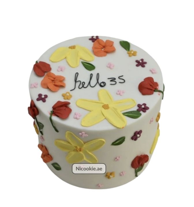 Floral hello cake with colorful buttercream flowers.